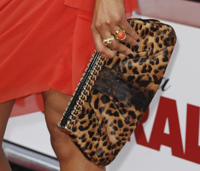 Zoe Saldana toting a leopard print handbag
