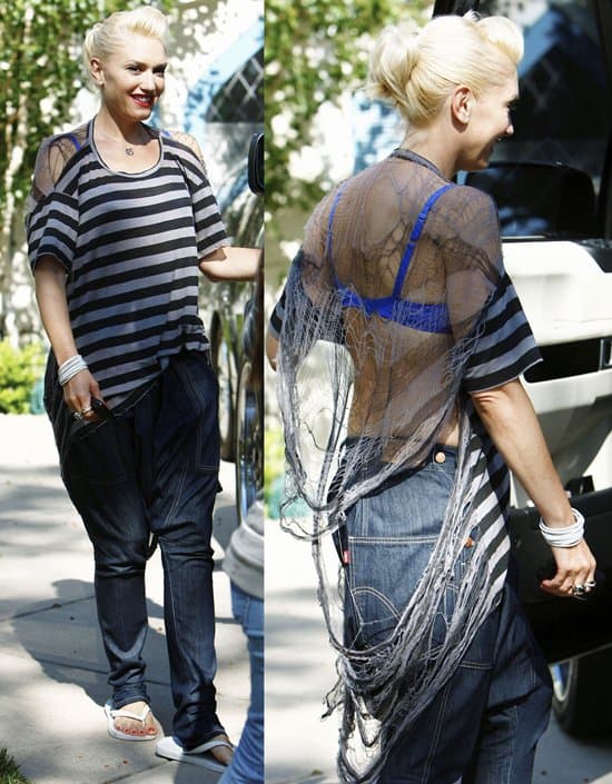 Gwen Stefani wears an electric blue bra under a cobweb-styled top outside her parents' home
