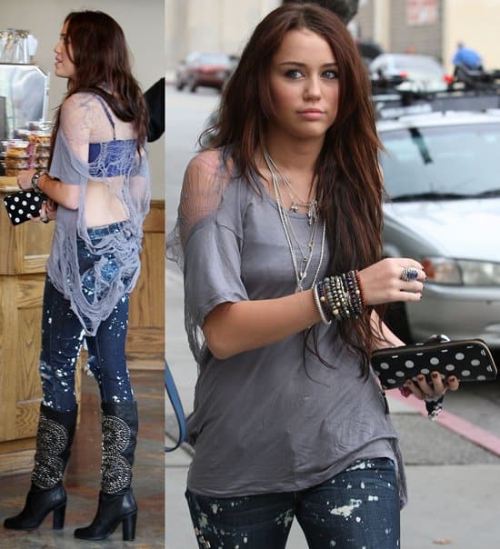 Miley Cyrus wears a shredded tee from Obesity and Speed while waiting for an iced coffee at a Coffee Bean