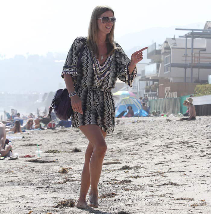 Nicky Hilton sporting a beaded and printed tunic dress in shades of black and grey