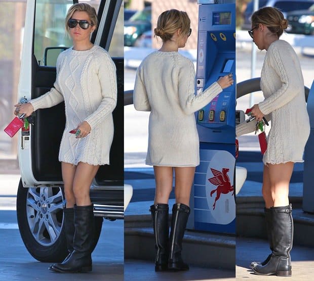 Ashley Tisdale styled her Pencey crew-neck, cable-knit sweater dress with Ash Scott distressed leather black boots
