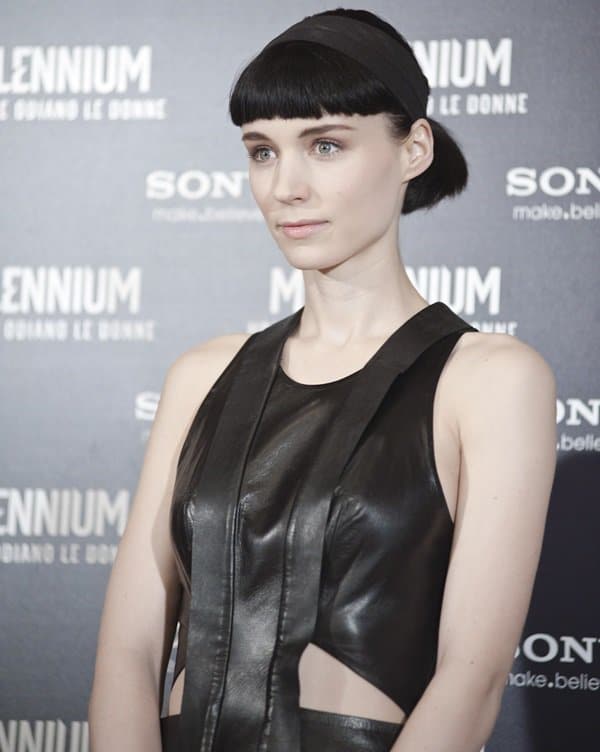 Rooney Mara in a leather dress attends the photocall of her new movie, 'The Girl with a Dragon Tattoo', in Rome