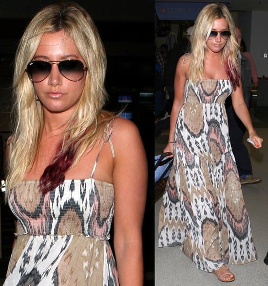 Ashley Tisdale arrives in on a flight from Hawaii at LAX International Airport