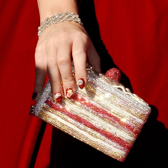 Katy Perry's cake clutch handbag by Judith Leiber and Tacori diamond silver cuff bracelet