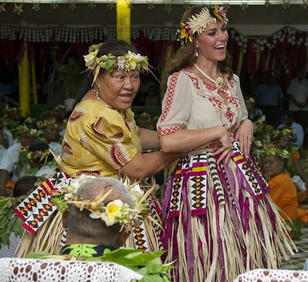 Catherine, Duchess of Cambridge a.k.a Kate Middleton dances with the the ladies at the Vaiku Falekaupule at an entertainment program during their visit to the remote Island Nation of Tuvalu on September 18, 2012