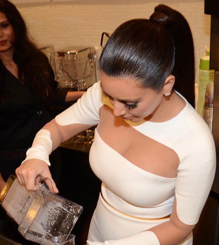 Kim Kardashian revealed cleavage in a bolero-type top