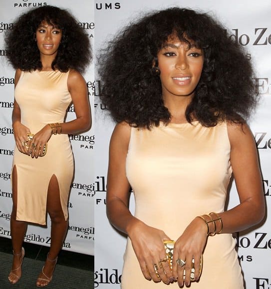 Solange Knowles wears a salmon-colored shift dress at the "Essenze" Collection Launch Event