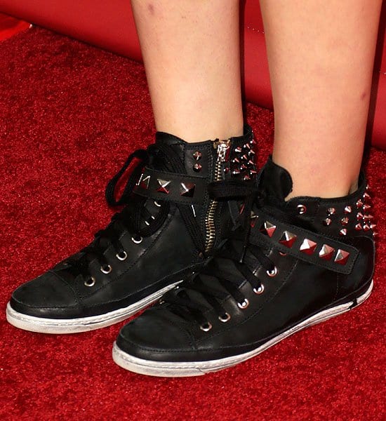 Katharine McPhee's studded black leather sneakers