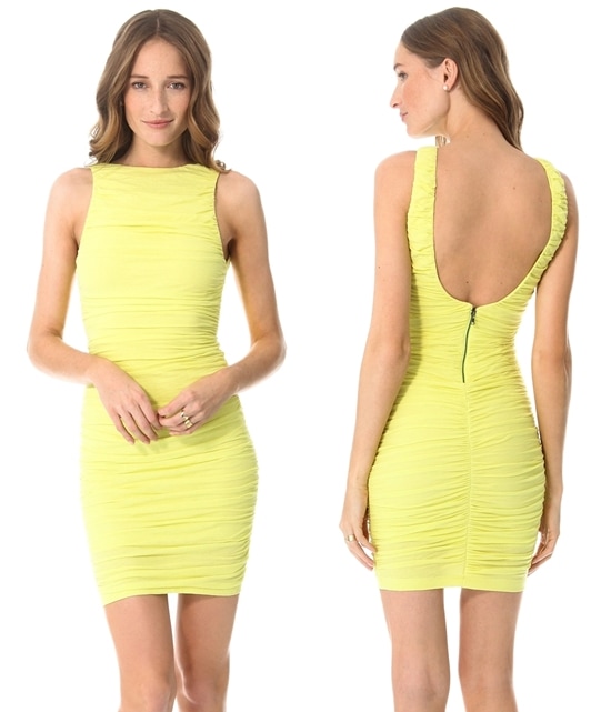 Lush ruching creates a flattering, draped effect as it flows across the formfitting silhouette of a lightweight lime-colored jersey dress from AIR by alice + olivia