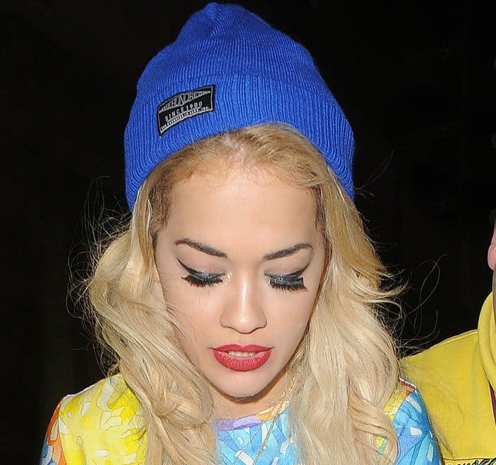 Rita Ora styled her dress with a blue beanie, giving her an edgy b-girl vibe