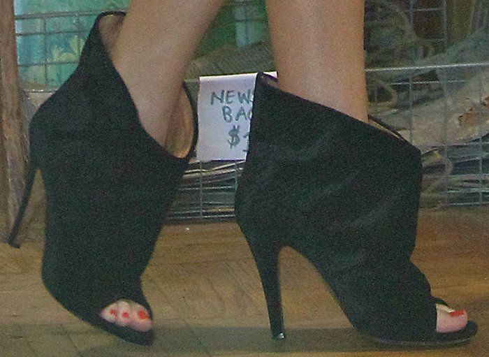 Khloe Kardashian shows off her toes in Maison Martin Margiela open-toe booties