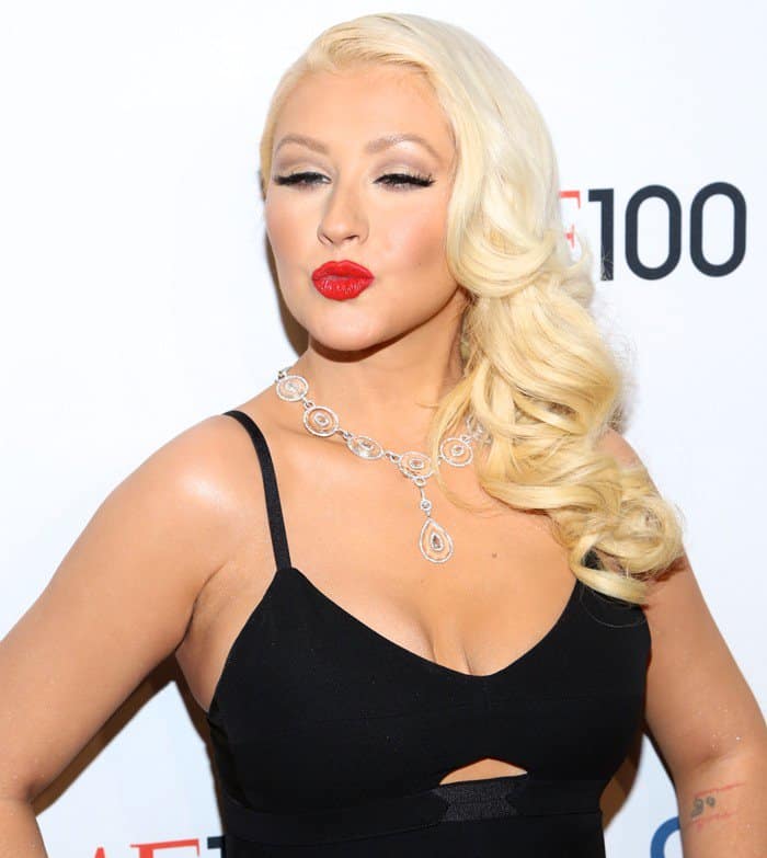 Singer Christina Aguilera in a black Victoria Beckham dress attends the TIME 100 Gala celebrating the ‘100 Most Influential People in the World’ at Jazz at Lincoln Center in New York on April 23, 2013