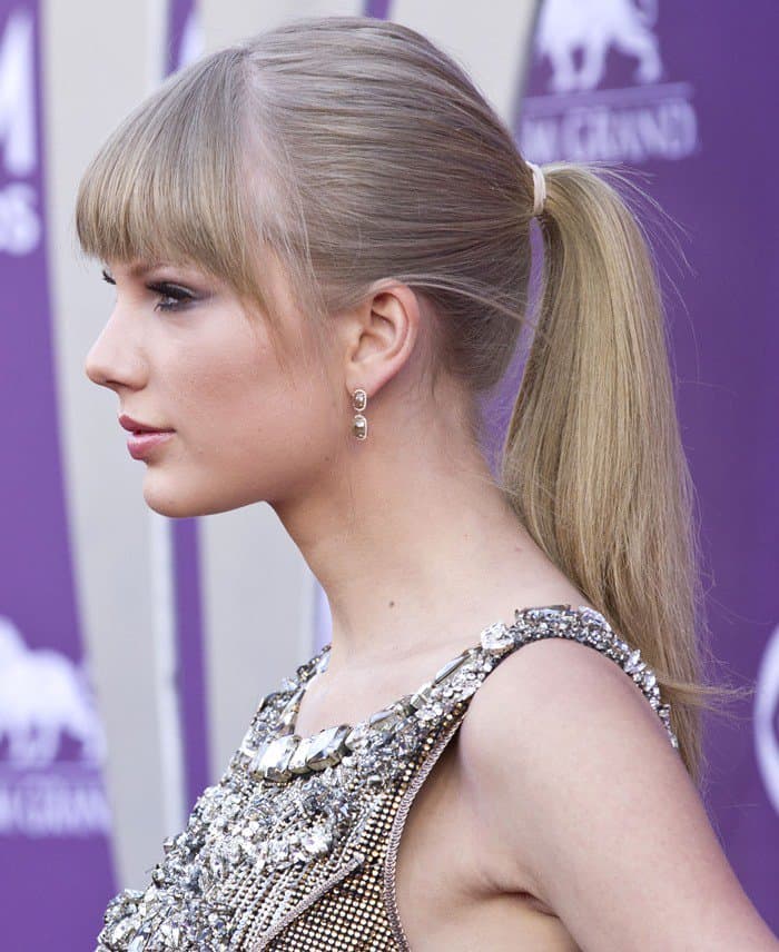 Taylor Swift showed off her ears and Norman Silverman earrings