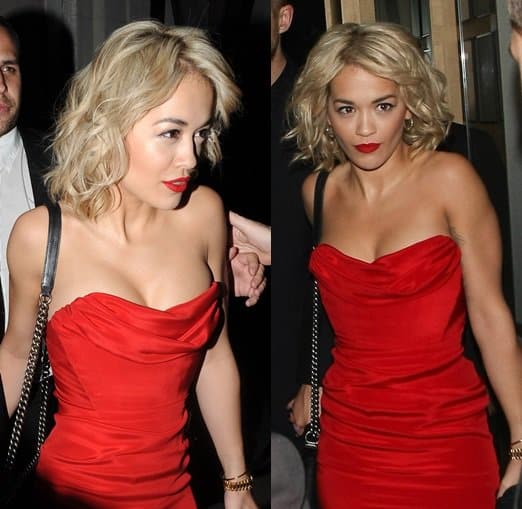Rita Ora wearing a floor-grazing dress with a really low-cut strapless neckline