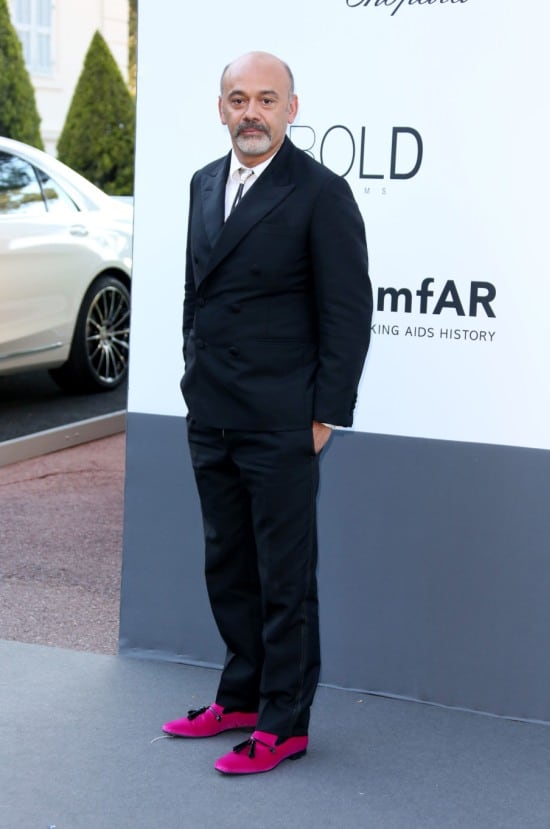 Christian Louboutin wearing standout shoes at the amfAR Cinema Against AIDS gala