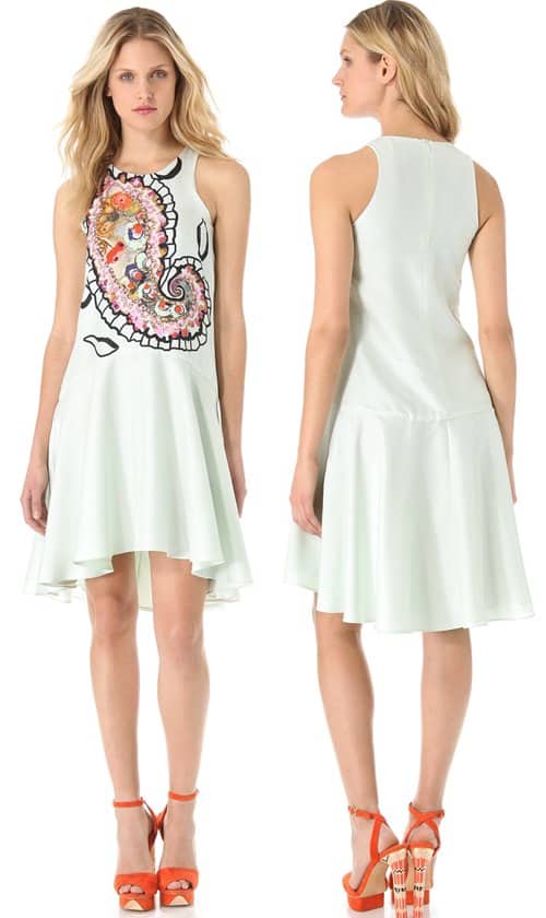 This mint-colored flapper-inspired tank dress is styled with a loose bodice and a graceful, swingy skirt