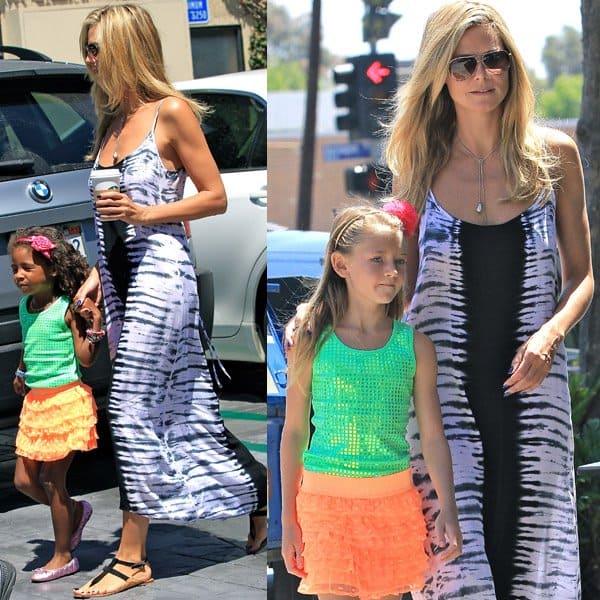 Heidi Klum wore a tie-dye maxi dress with black gladiator sandals, a teardrop silver necklace, and aviator shades