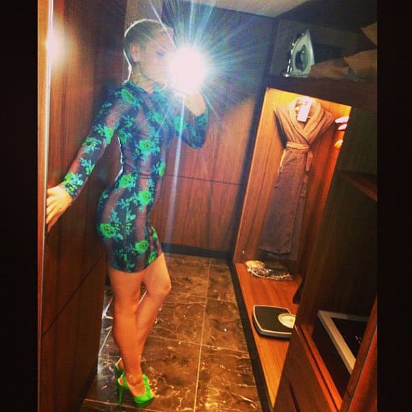 Jessie J styled her floral dress with green Charlotte Olympia Serena sandals