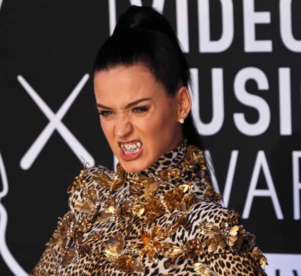 Katy Perry playfully showing off her grills on the red carpet