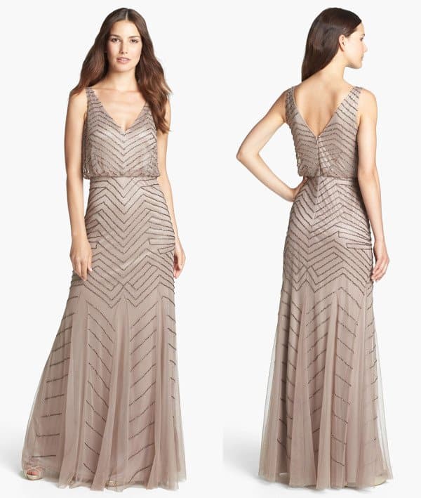 Polished beads lightly stripe a suave mesh gown rich with sophisticated style from the V-neck blouson bodice to the gently flared, full-length skirt