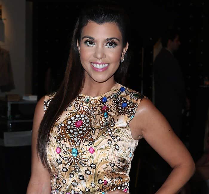 Kourtney Kardashian rocks a jewel-printed structured sleeveless dress by ASOS