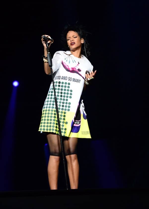 But since this is Rihanna, she was content with a printed shift dress worn with fishnet short tights
