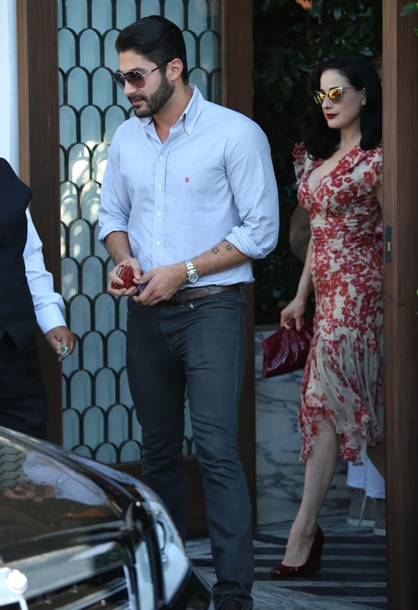 Dita von Teese with a male friend leaving Cecconi's Restaurant in Los Angeles on October 16, 2013