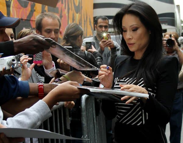 Actress Lucy Liu signs autographs for fans