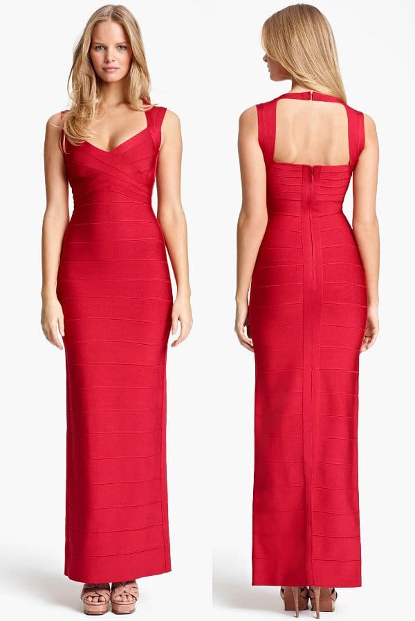 Crisscrossed panels enhance the flattering bodice of a striking, full-length bandage red dress cut from a dense knit that hugs curves