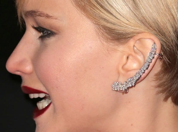 Jennifer Lawrence's wingtip earrings by Anita Ko