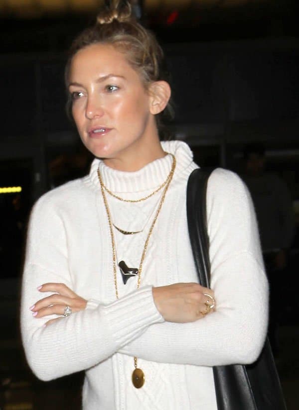Kate Hudson accessorized with several necklaces