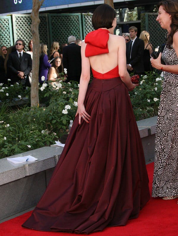 Michelle Dockery's gown boasted a halter-style, low-back bustier top with a striking bow-like detail fastened at the back of the neck at the 65th Annual Primetime Emmy Awards
