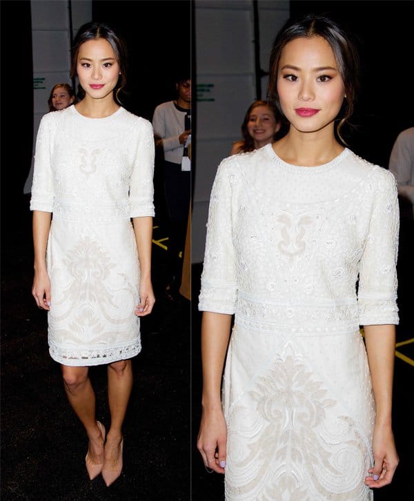 Jamie Chung in a white lace dress at the Monique Lhuillier show during New York Fashion Week Fall 2014