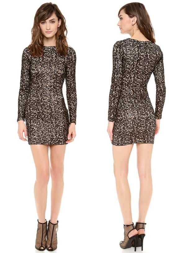 Sequins accent the webbed lace on a figure-hugging black ivy lace/nude mini dress
