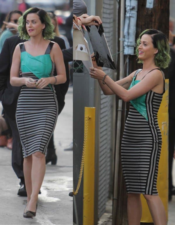 Katy Perry with green highlights in her hair, greeting fans as she departs Jimmy Kimmel Live!