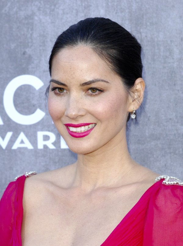 Olivia Munn in a red gown by Reem Acra at the 49th Annual Academy of Country Music Awards in Las Vegas on April 6, 2014