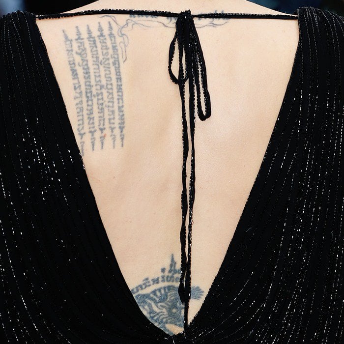 Angelina Jolie's tattoo is meant to be a protection script for her son Maddox Chivan Jolie-Pitt