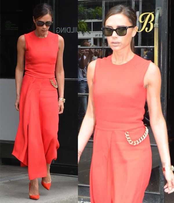 Victoria Beckham wearing a bright red dress and matching shoes in Manhattan