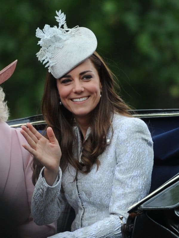 Catherine styled a Jane Taylor hat with an Alexander McQueen coat