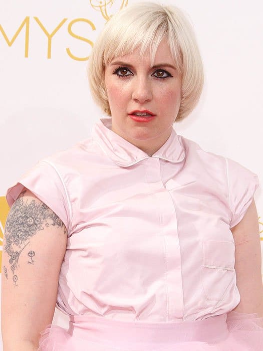 Lena Dunham's platinum bowl cut and heavily outlined eyes