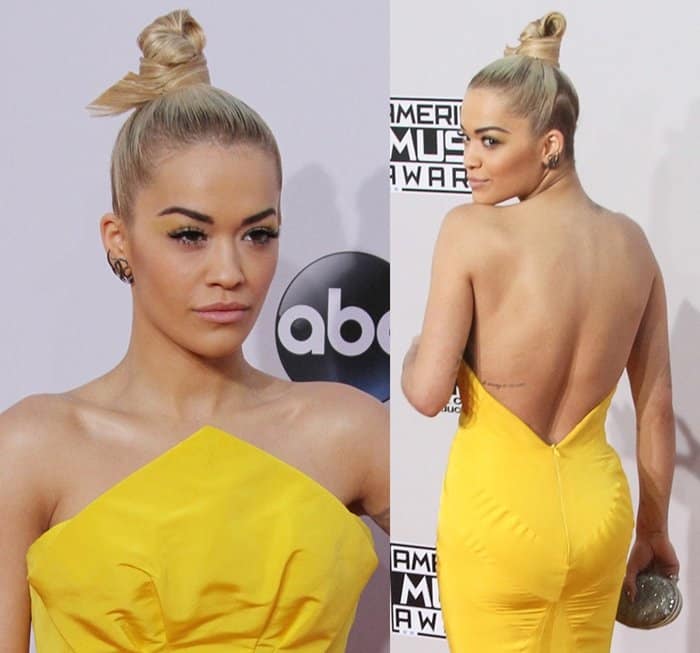 Rita Ora opted for an architectural top-knot hairstyle and bold makeup, including feathery lashes and yellow eye shadow, at the 2014 American Music Awards