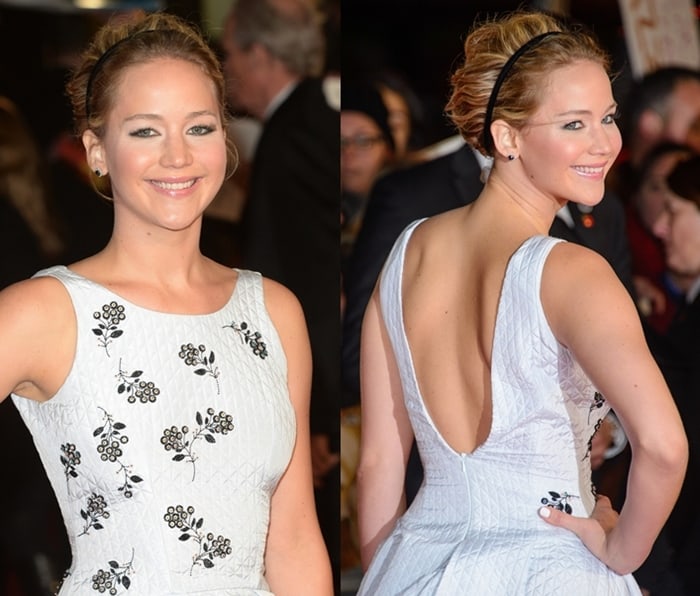 Jennifer Lawrence looked lovely in a dress in light blue with black floral embroidery and a rise-and-fall hemline