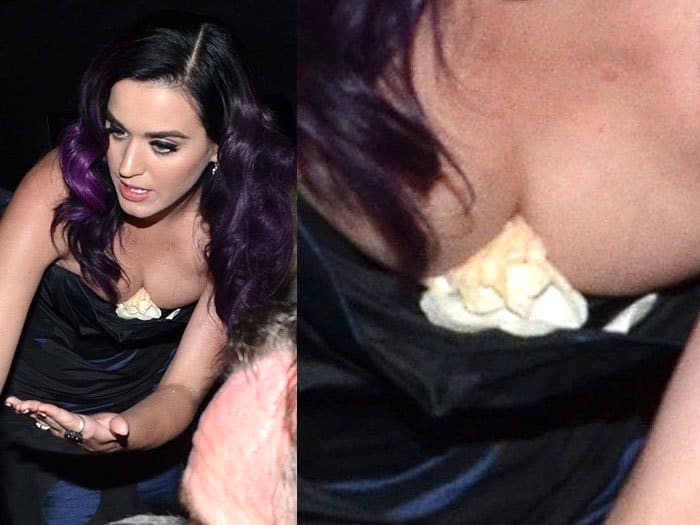 Despite not needing bra stuffing, Katy Perry raised curiosity when spotted with a crumpled-up cloth underneath her Vivienne Westwood Spring 2012 polka-dot dress