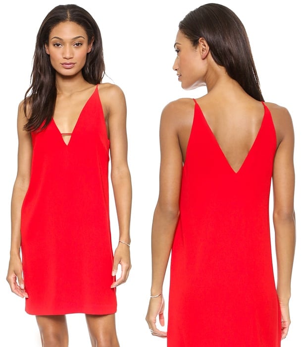 This festive mini dress makes a sultry impression in a deep, double-V profile