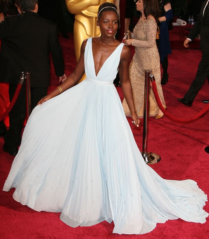 Lupita Nyong'o wore a powder blue custom Prada gown with crystal details to the 86th Academy Awards, where she won Best Supporting Actress for her performance in "12 Years a Slave," in Los Angeles