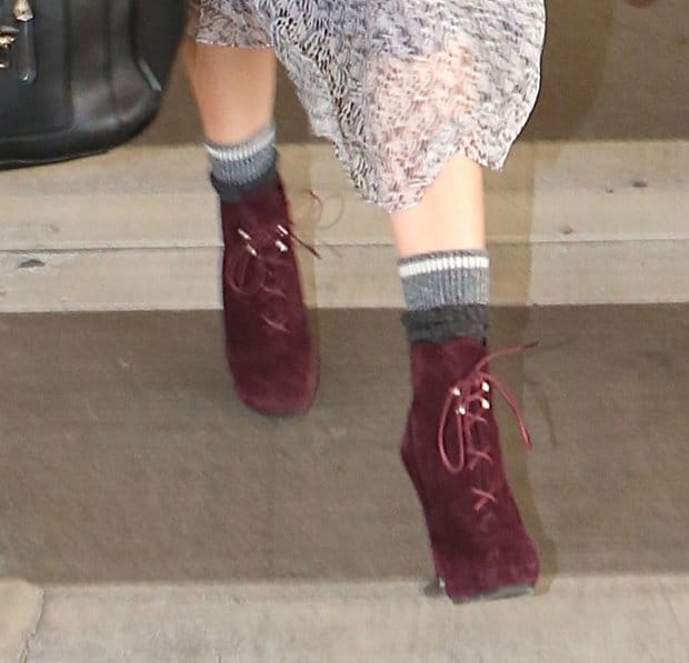 Diane Kruger kept her feet cozy and stylish with a pair of thick socks and oxblood red lace-up boots