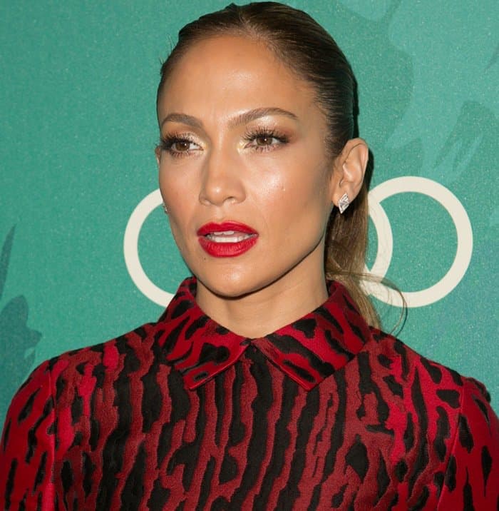 Jennifer Lopez in a black-and-red leopard-print shirt-dress by Valentino