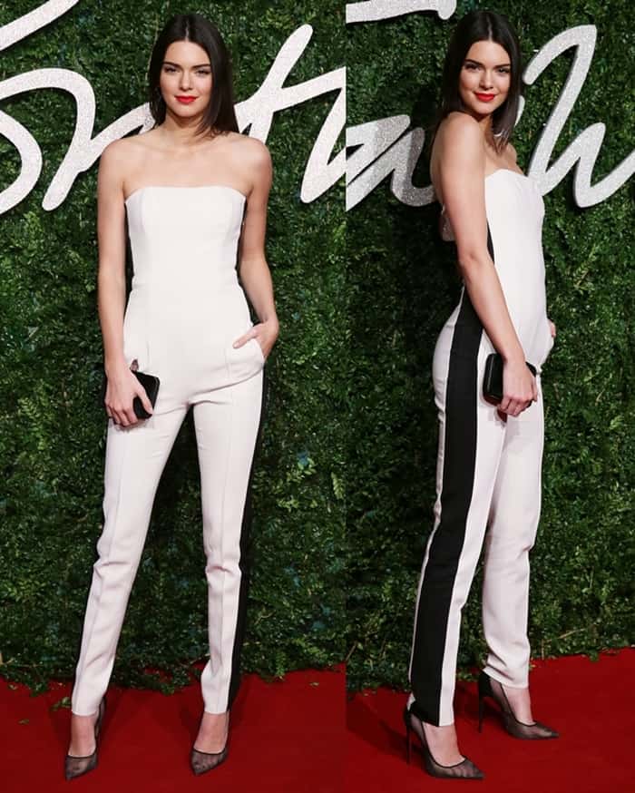 Kendall Jenner looked incredibly statuesque, dressed in a white strapless jumpsuit with black stripes running down the side