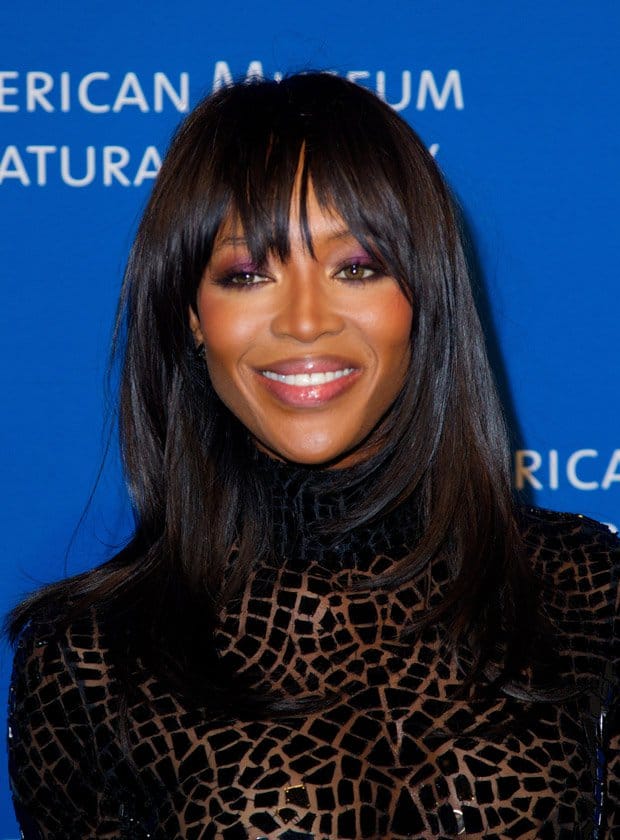 Naomi Campbell rocked it with a fur shawl, some statement rings, and purple eyeshadow