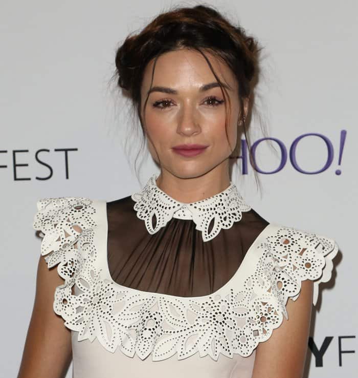 Actress Crystal Reed shone in a stunning Valentino dress that epitomized girly chic with its flounced hem, sheer yoke, and contemporary laser-cut detailing at the "Teen Wolf" event